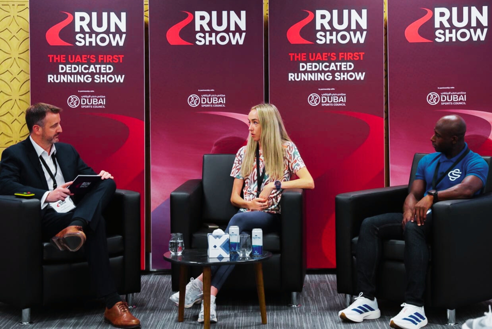 Mike Seaman, Group CEO of Raccoon Media Group sits with Eilish McColgan, British Olympian and British and European record holder and Ghani Souleymane, Dubai Fitness Challenge, Hall of Fame Winner
